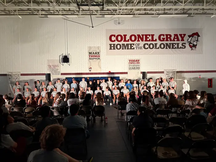 Ian Stewart performing at Colonel Gray High School