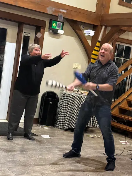 Ian Stewart performing interactive magic at a corporate Christmas party